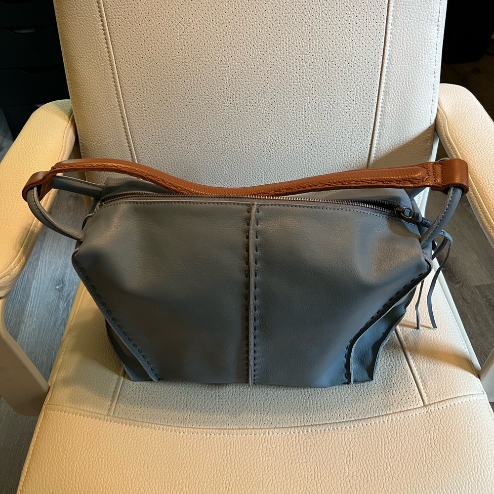 Blue-grey faux leather bag by The Sak